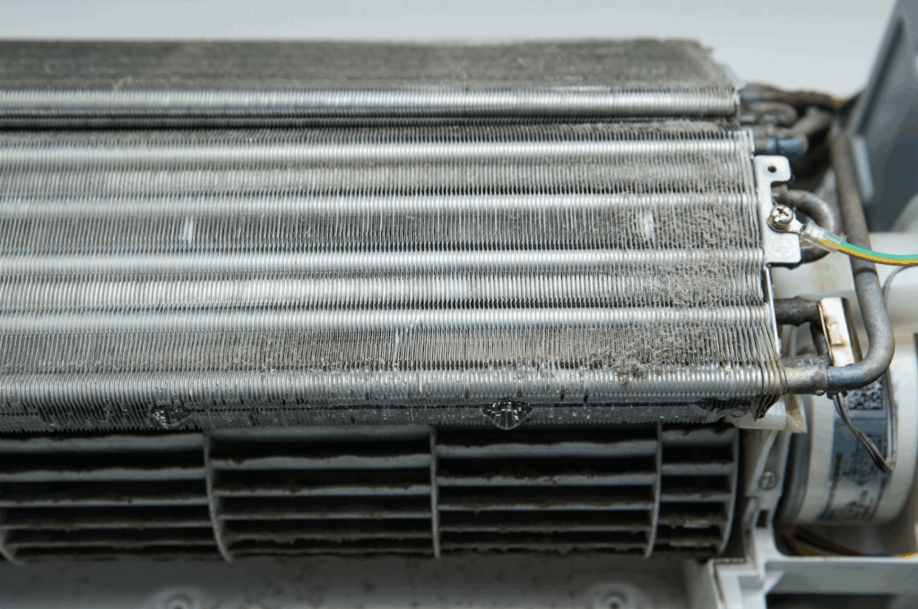 Dirt and dust on a refrigeration coil emphasizes the importance of commercial refrigeration maintenance.