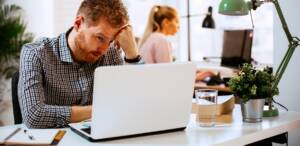 Businessman realizing he skipped commercial HVAC maintenance