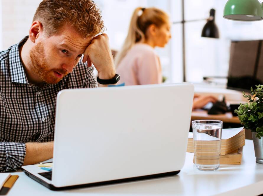 Businessman realizing he skipped commercial HVAC maintenance
