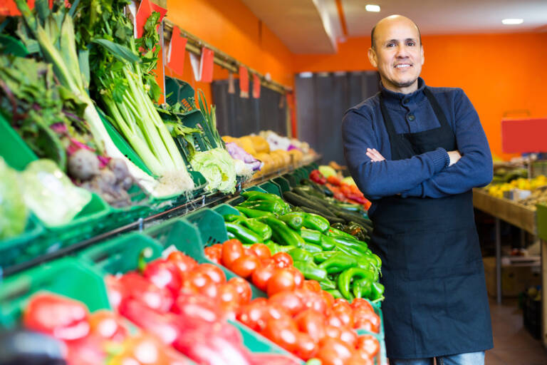 Business manager appears with a selection of fresh produce
