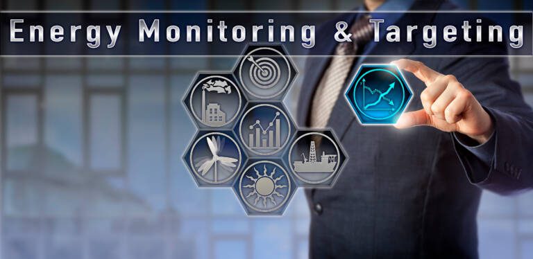 Facility manager using energy monitoring technology to identify energy waste in a commercial building
