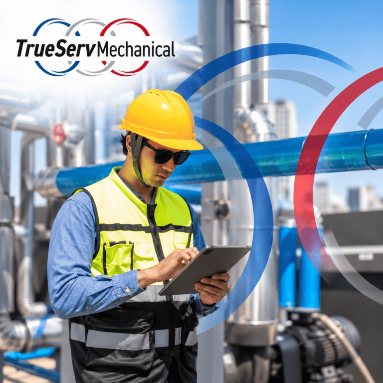 Technician evaluating existing commercial HVAC equipment using system performance data